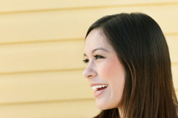 side portrait of woman smiling 2022 03 04 01 51 02 utc